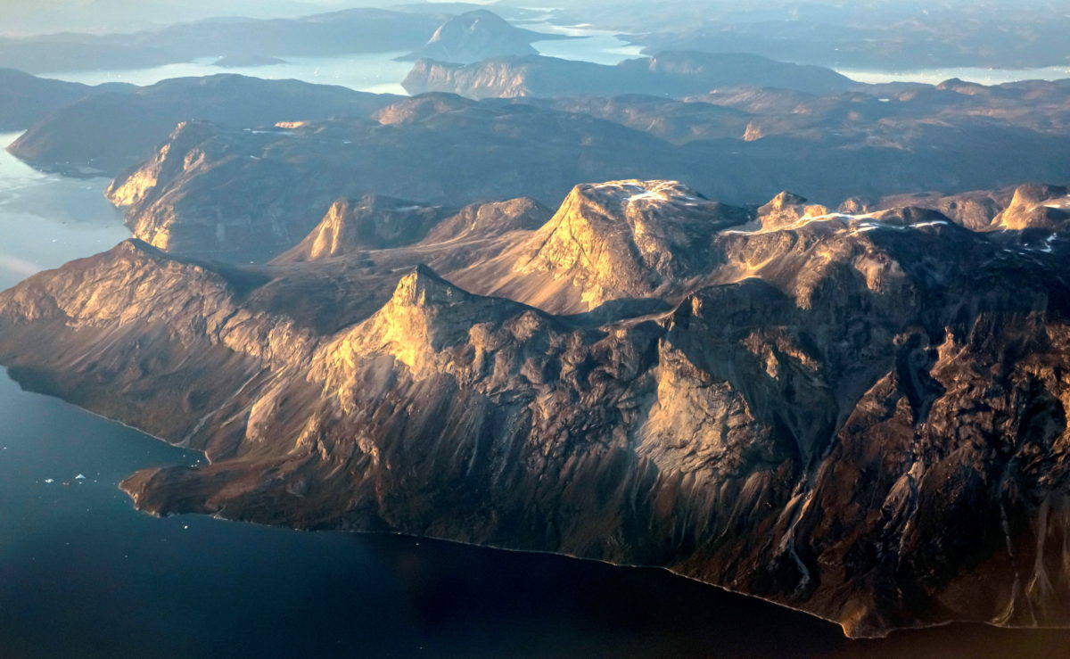 FILE PHOTO: Mountains are pictured at the west coast close to Nuuk, Greenland, September 4, 2021 | Photo by Hannibal Hanschke/Reuters.