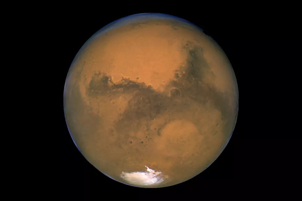 Mars, the Red Planet, may seem beyond reach in this view from NASA's Hubble Space Telescope in 2003. But the space company Uwingu has launched a "Beam Me to Mars" project to let the public send messages to the Red Planet in order to raise funds for space exploration. | Image credit: NASA