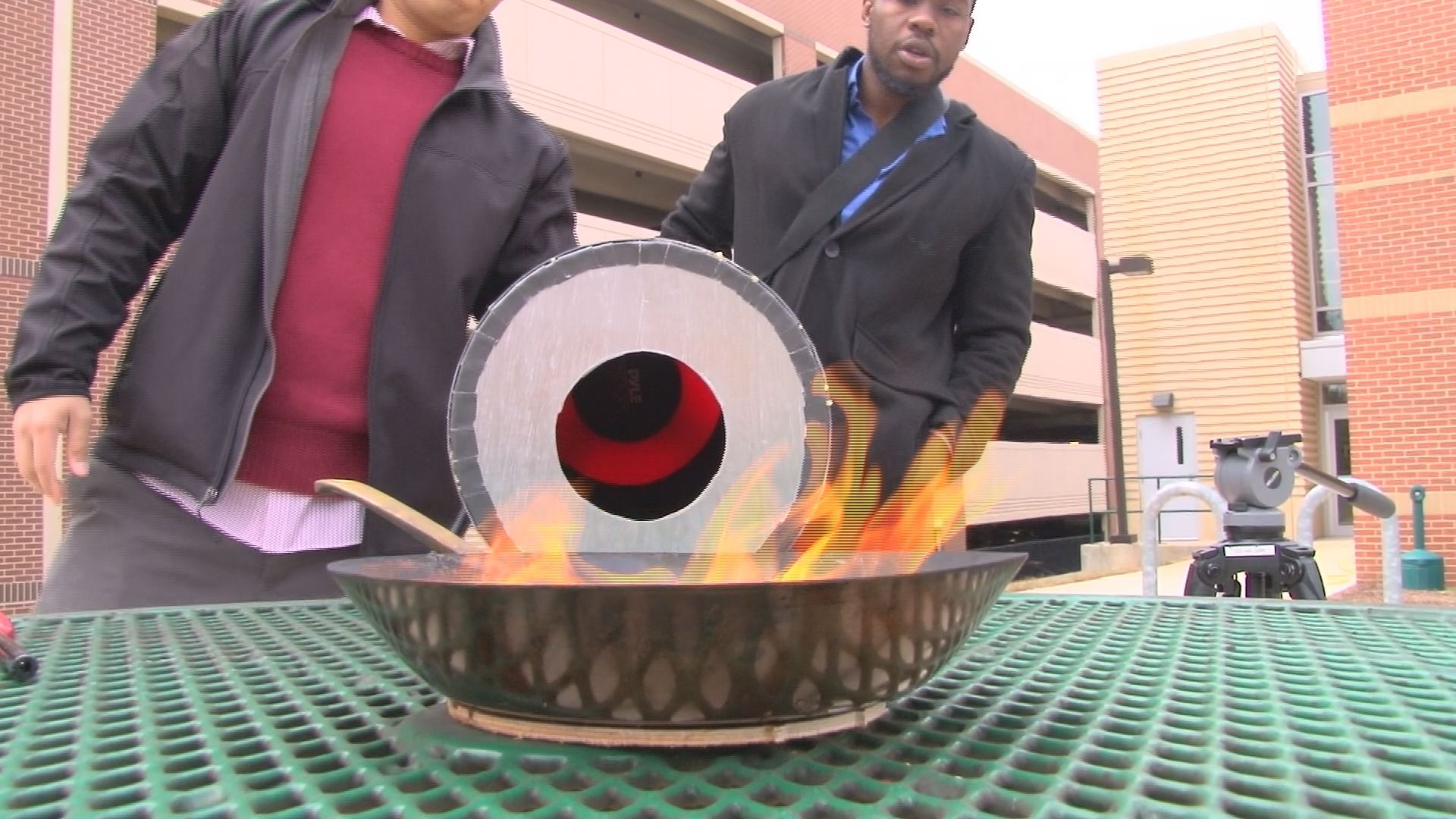 George Mason students Viet Tran and Seth Robertson have created a device that uses sound to extinguish fires.