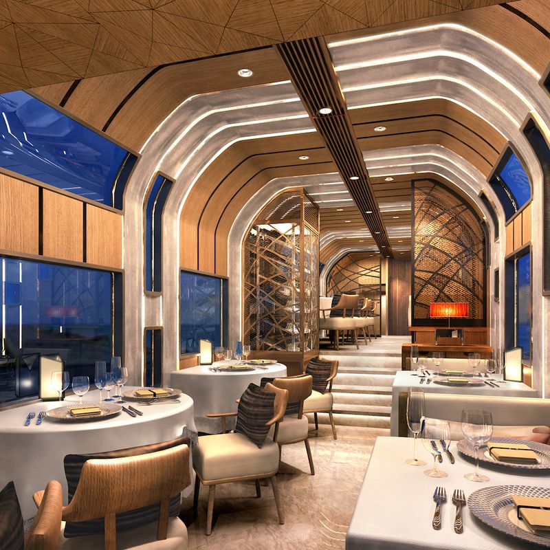 Passengers can enjoy a meal while the train speeds through the country.